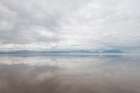 Ireland-Inch Strand Landscape with fog on ocean and beach Art Print